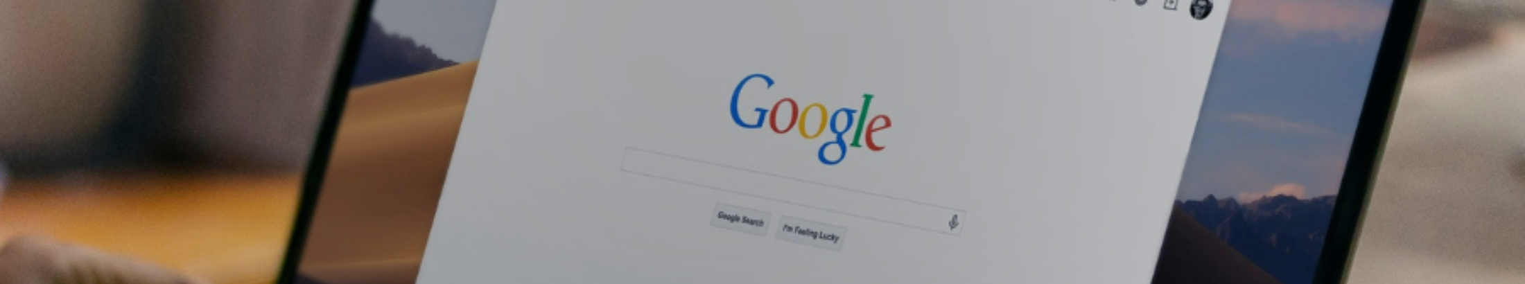 A picture of the Google search engine interface on a laptop