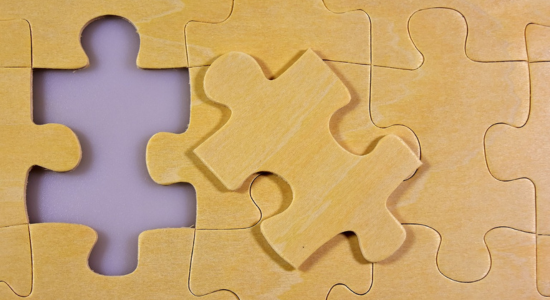 A jigsaw puzzle missing a puzzle piece.