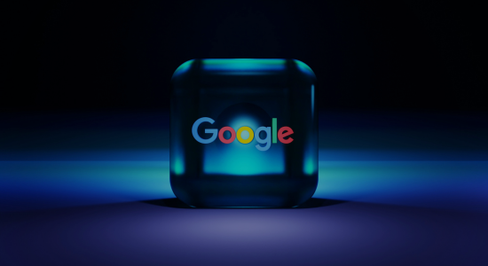 The Google logo on a 3D cube on an ambient blue background