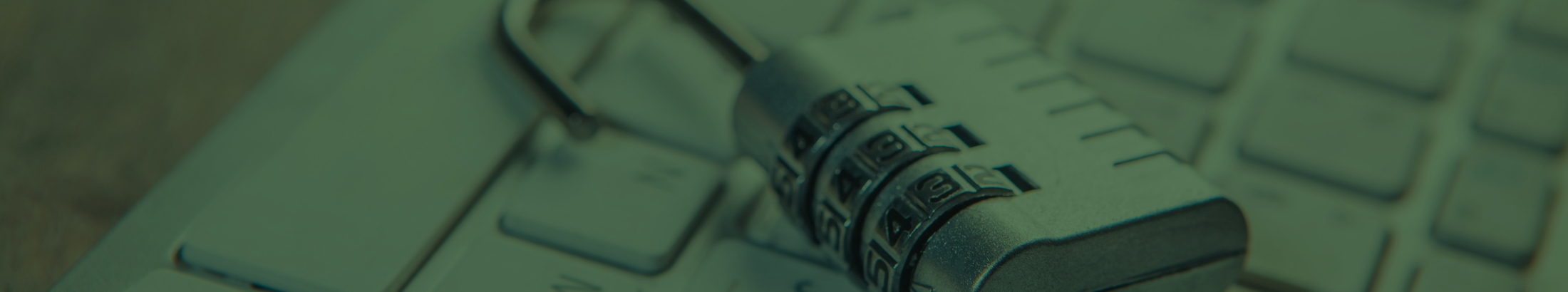 Blog post banner image - an open padlock resting on a computer keyboard