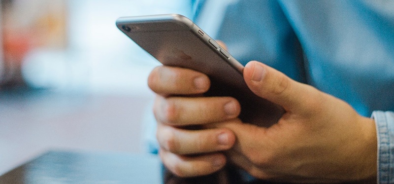 Man checking his mobile phone